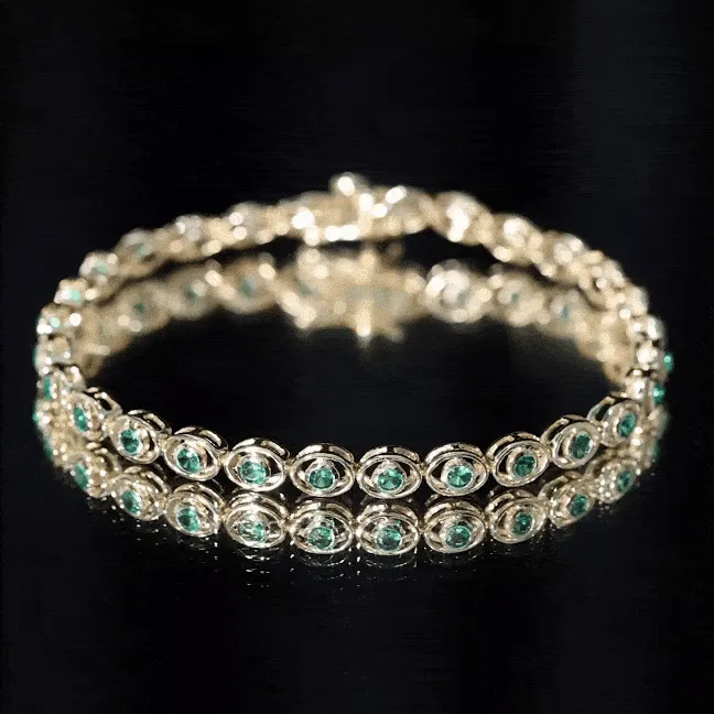 Created Emerald Tennis Bracelet in Bezel Setting