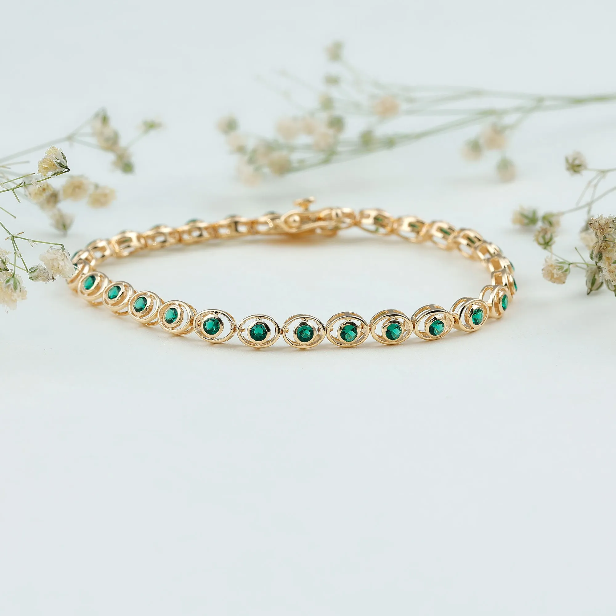 Created Emerald Tennis Bracelet in Bezel Setting