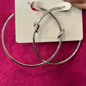 Knotted Together Simple Oversized Hoops with Knot